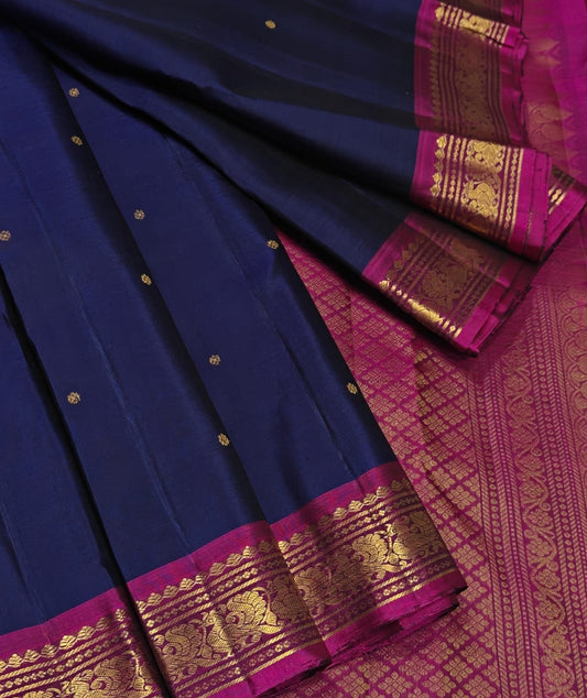 Navy Blue Kanjivaram Silk Saree with Pink Border & Traditional Gold Zari Work