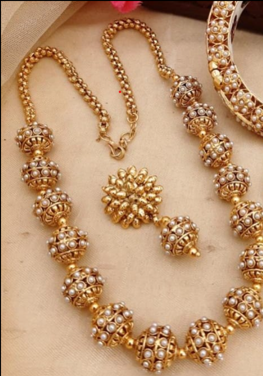 Gold and White Pearl Jewelry