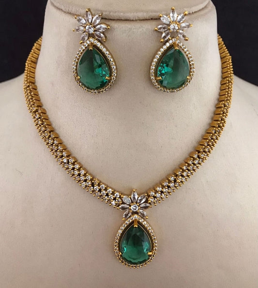 Gold jewelry with 3 Green Stone