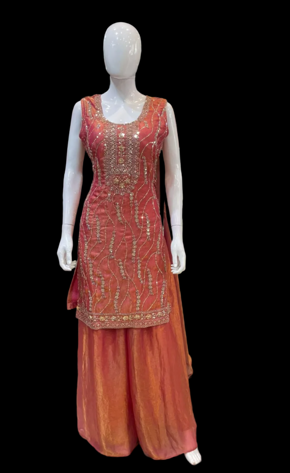 Pastel orange sharara suit in USA.  Embroidery full set